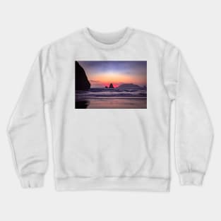 Red sunset behind coastal rock Crewneck Sweatshirt